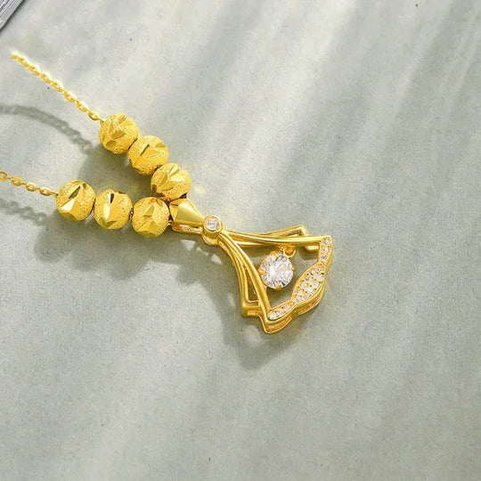 Gold Aura Heart Necklace & 24K Gold Fan Necklace – Elegant Jewelry Collection