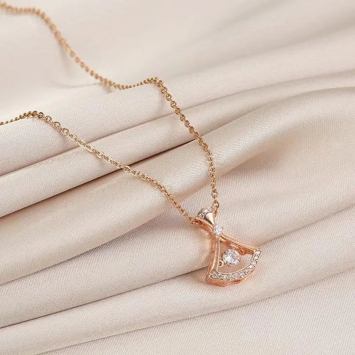 Gold Aura Heart Necklace & 24K Gold Fan Necklace – Elegant Jewelry Collection